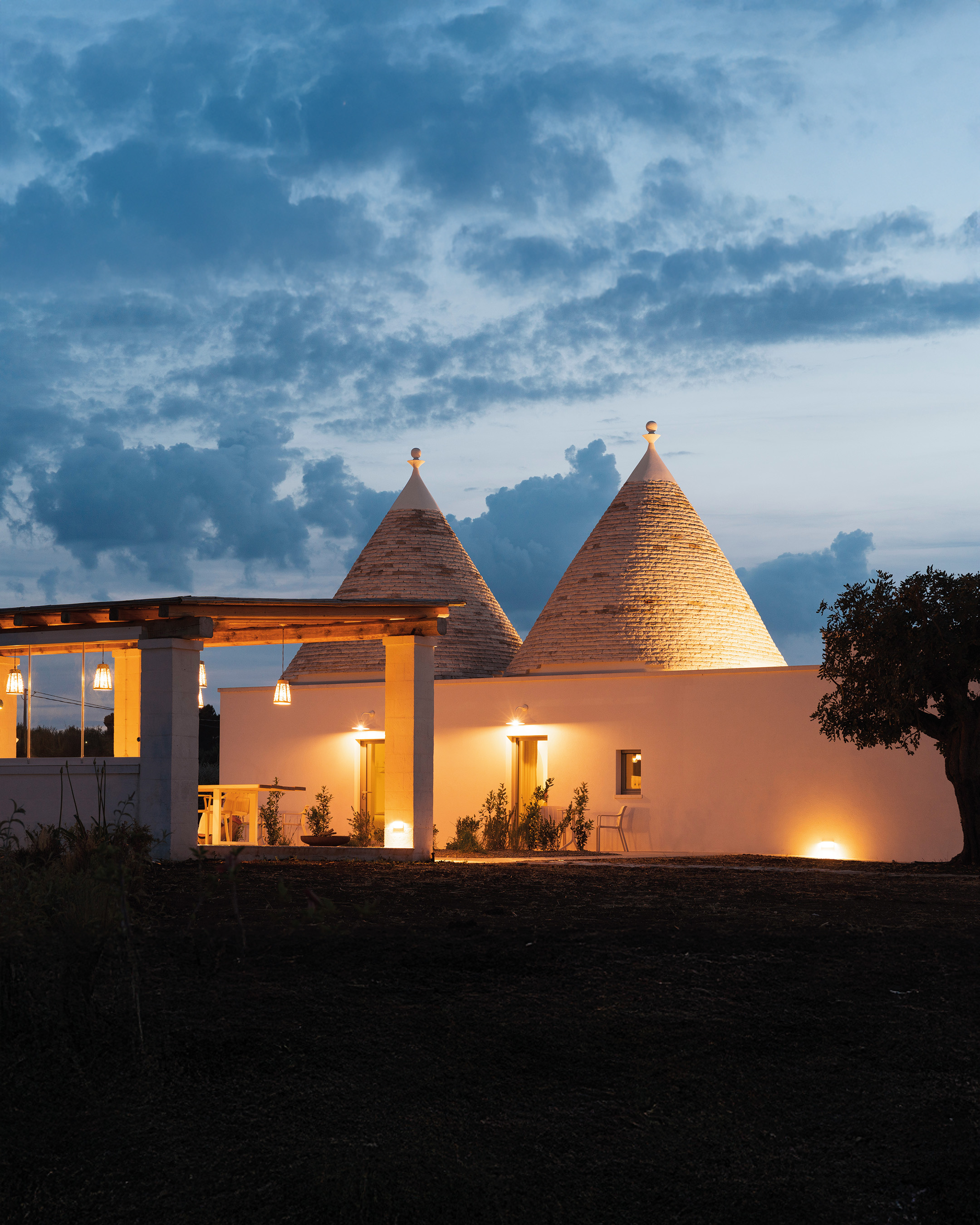 Fotografia interni masseria Puglia con atmosfera serale – fotografia d'interni